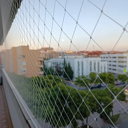 Instalación de red de protección para balcones y terrazas en Valencia - KidoSafe
